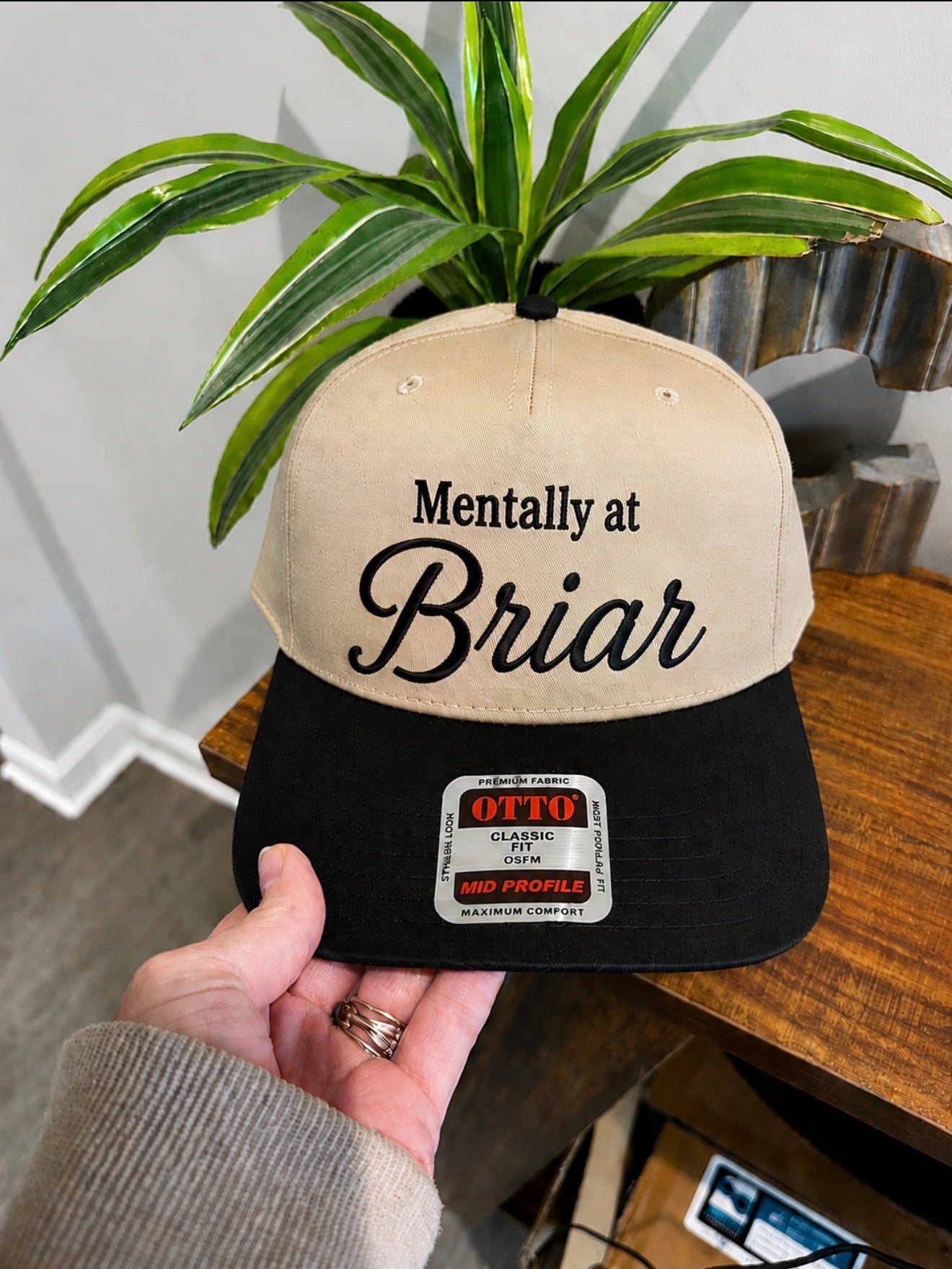 “Mentally at Briar” off campus trucker hat